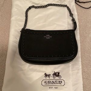 Authentic Coach brand new bag, has never been used.